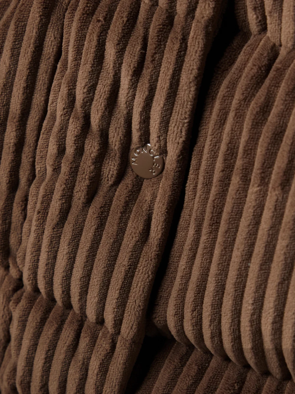 Close-up detail of the Moncler Daos Hooded Padded Quilted Corduroy Down Jacket