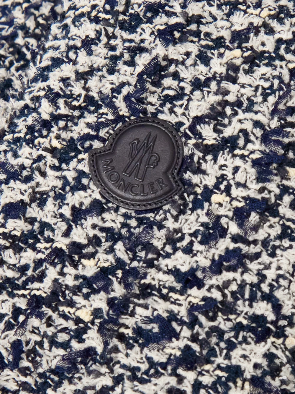 Close-up detail of the Moncler Dauphin Quilted Shell-paneled Cotton-blend Tweed Down Jacket