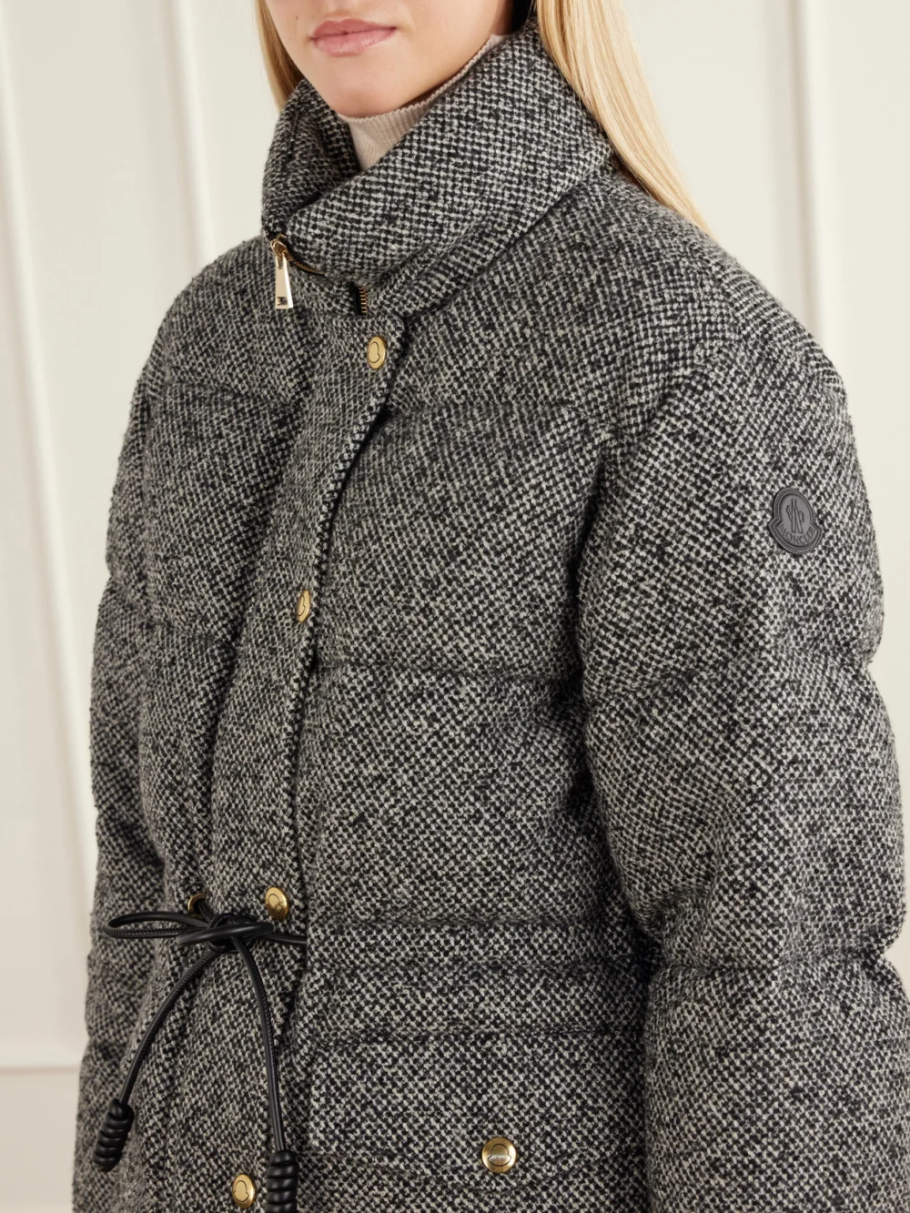 Close-up detail of the Moncler Diaphanes Wool-blend Quilted Down Jacket