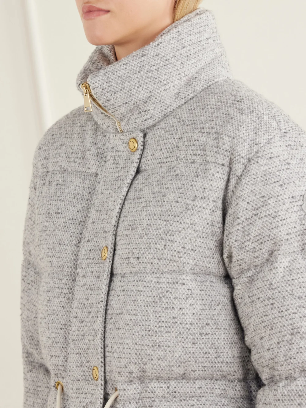 Close-up detail of the Moncler Diaphanes Wool-blend Quilted Down Jacket