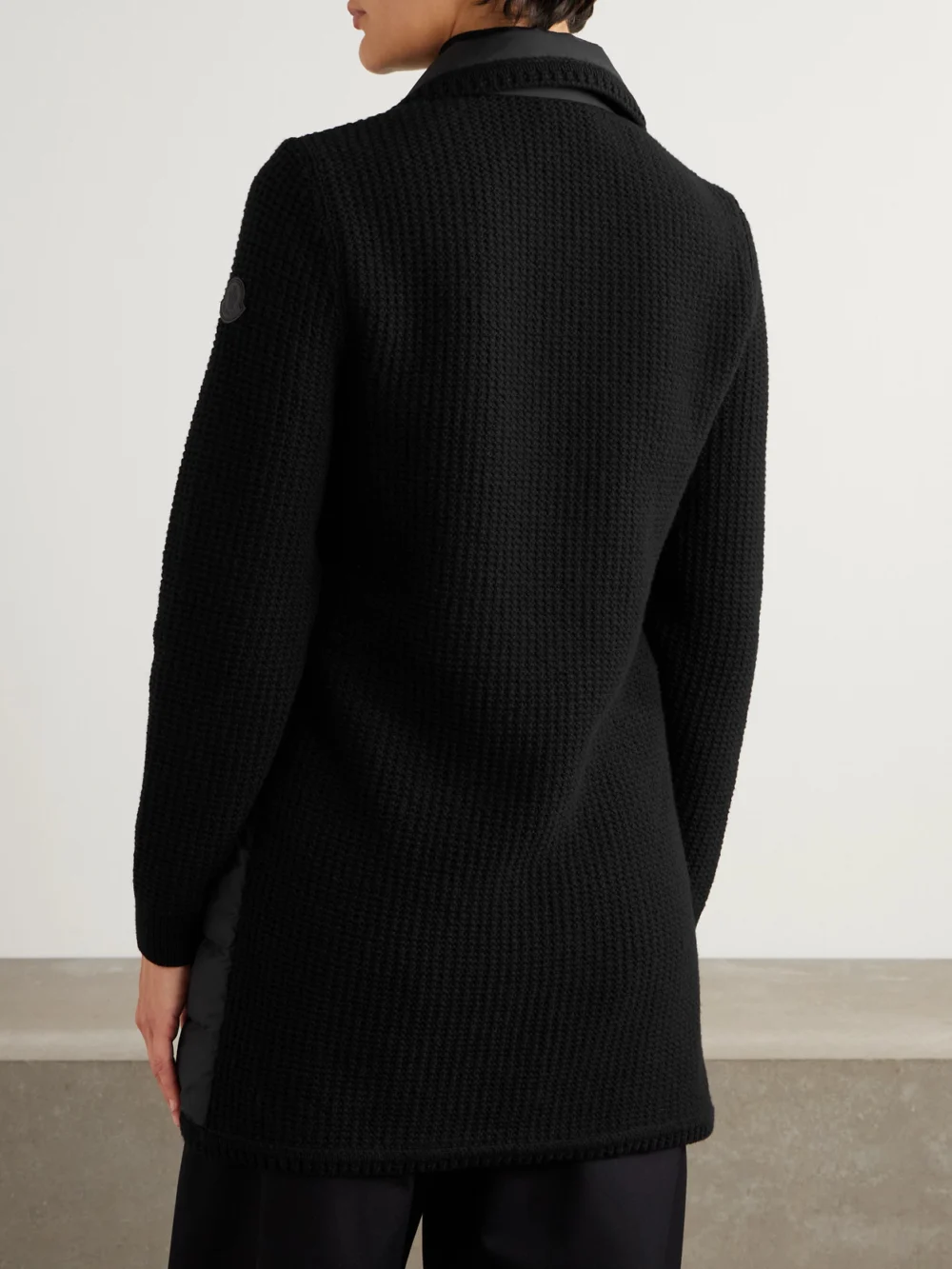 Back view of the Moncler Double-breasted Wool and Cashmere-blend and Quilted Shell Down Cardigan.