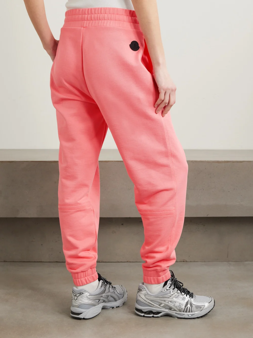 Back view of the Moncler Embossed Cotton-jersey Tapered Track Pants