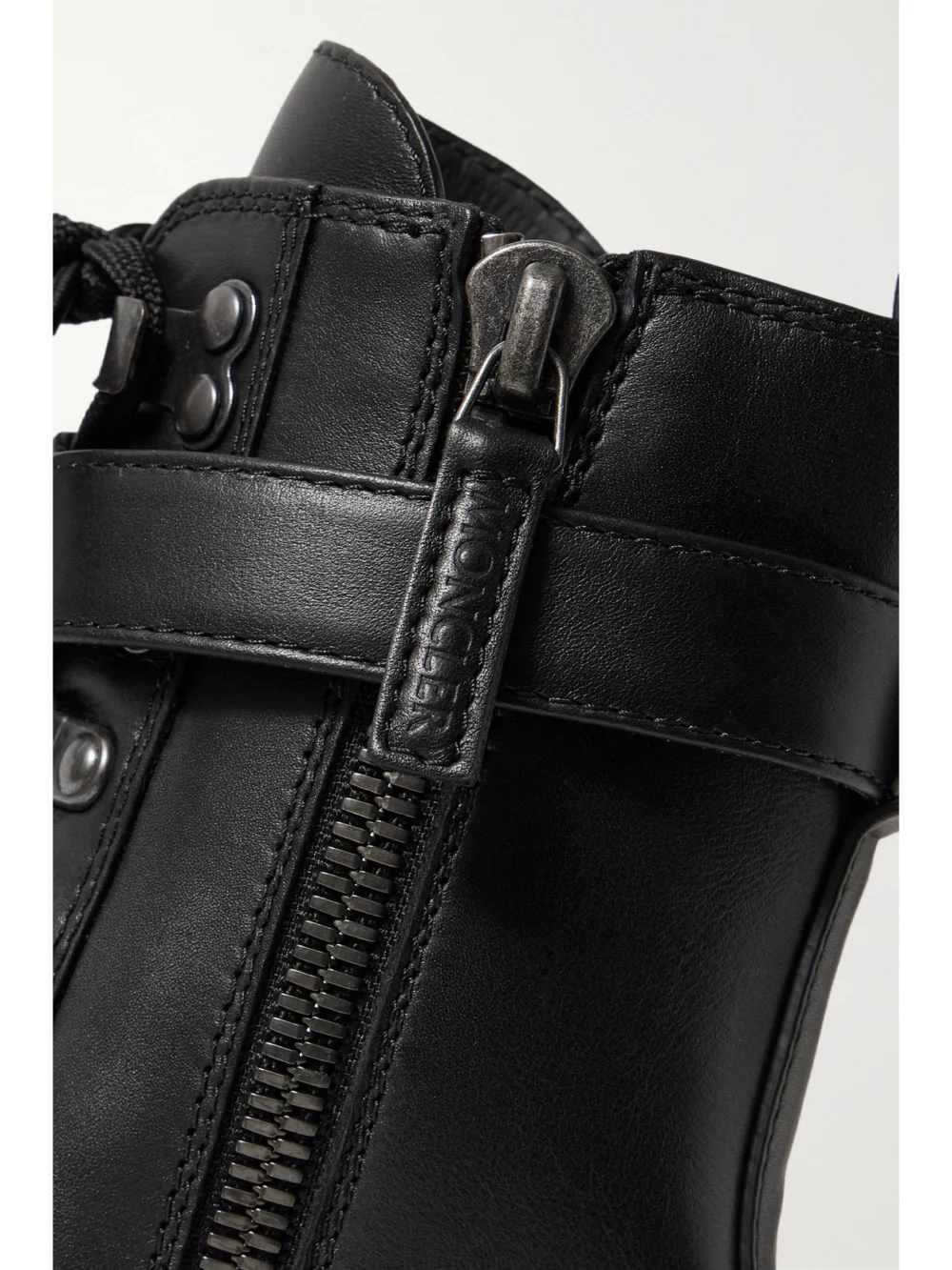 Close-up detail of the Moncler Envile Buckled Leather Combat Boots
