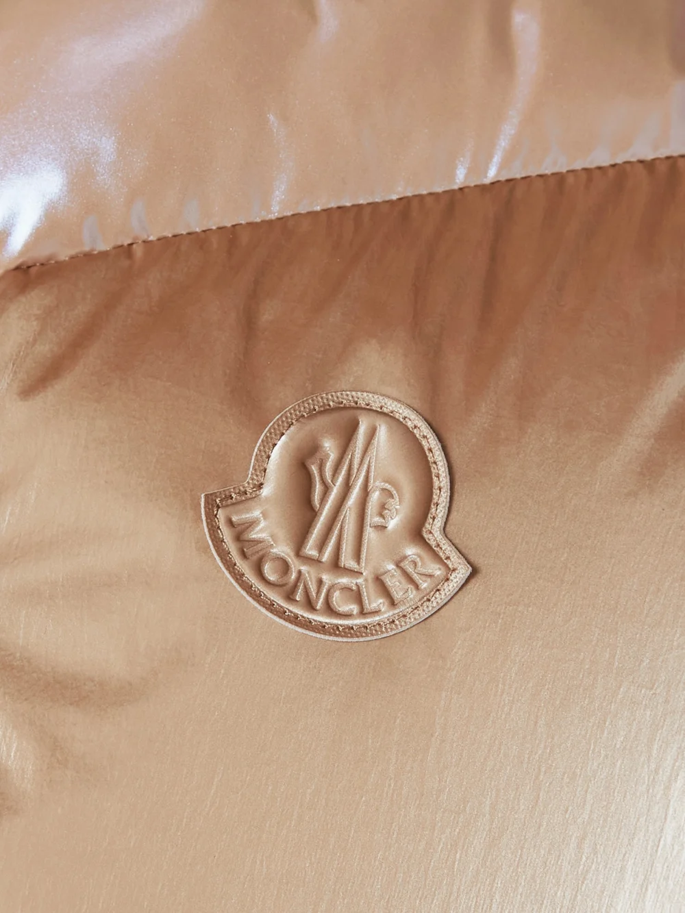 Close-up detail of the Moncler Faucille Quilted Metallic Shell Down Vest