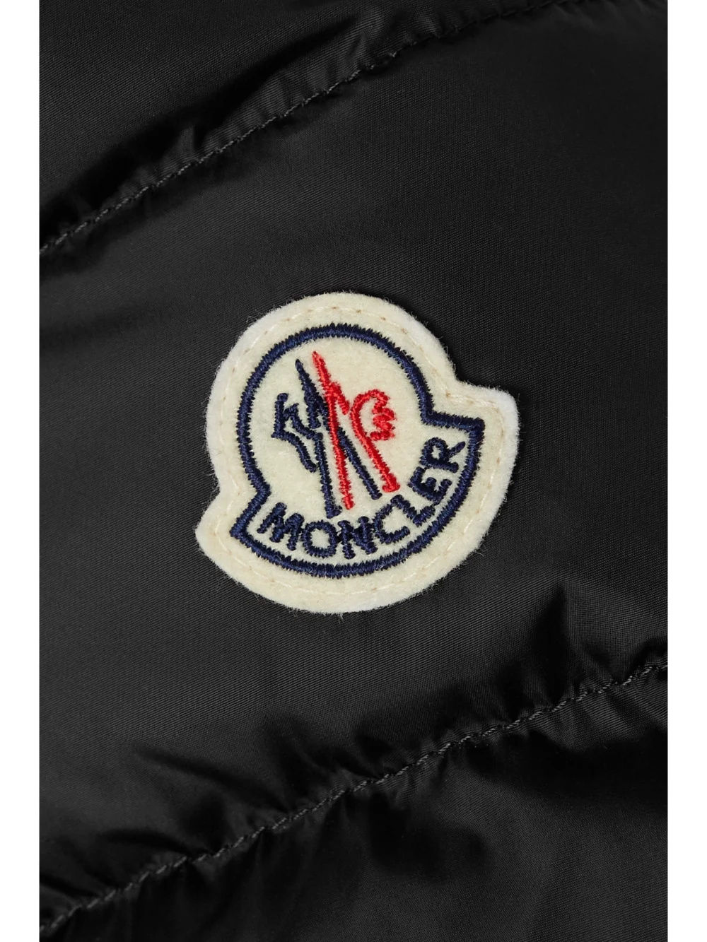 Close-up detail of the Moncler Flammette Hooded Quilted Shell Coat