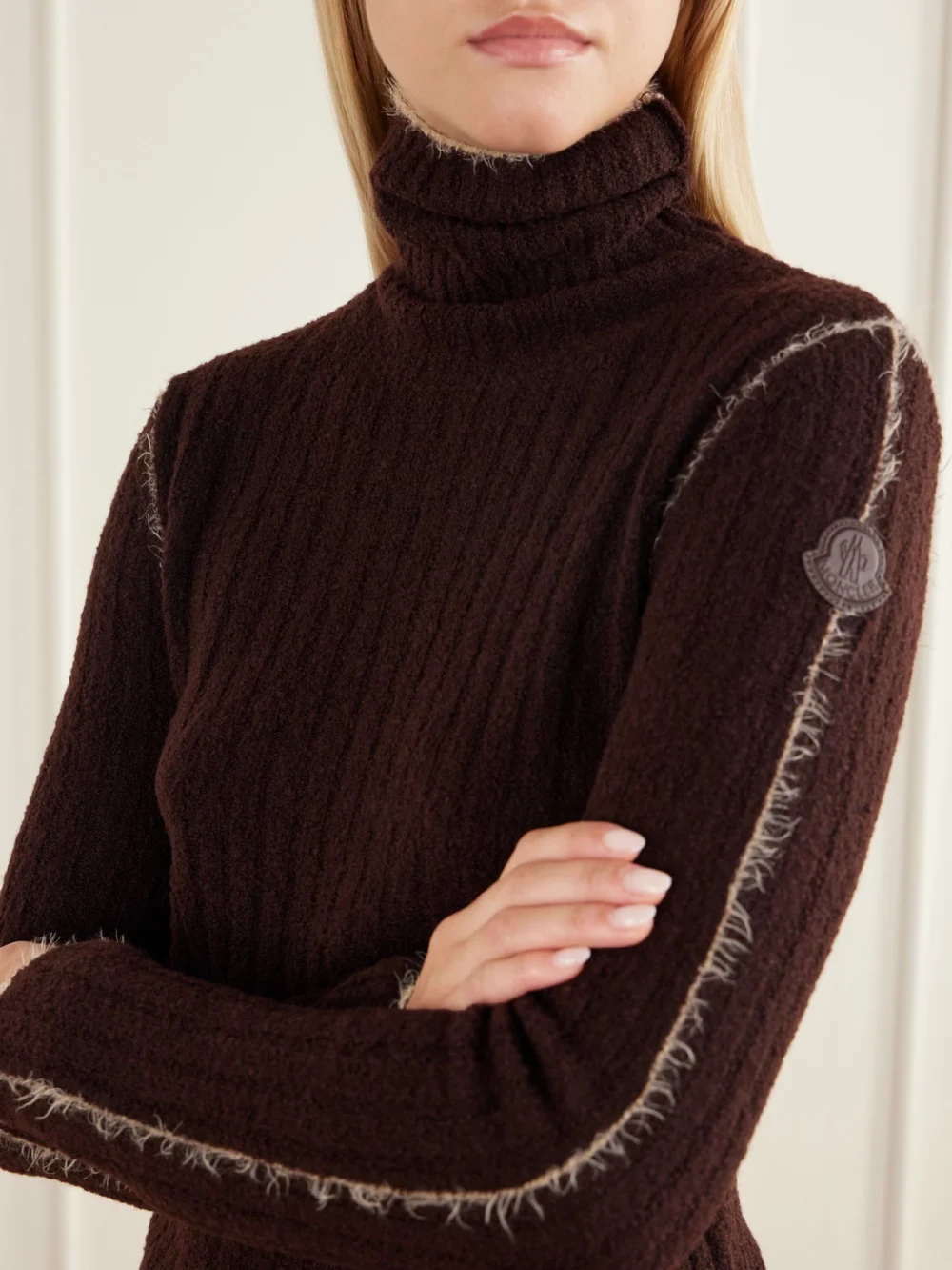 Close-up detail of the Moncler Frayed Ribbed Wool-blend Turtleneck Sweater