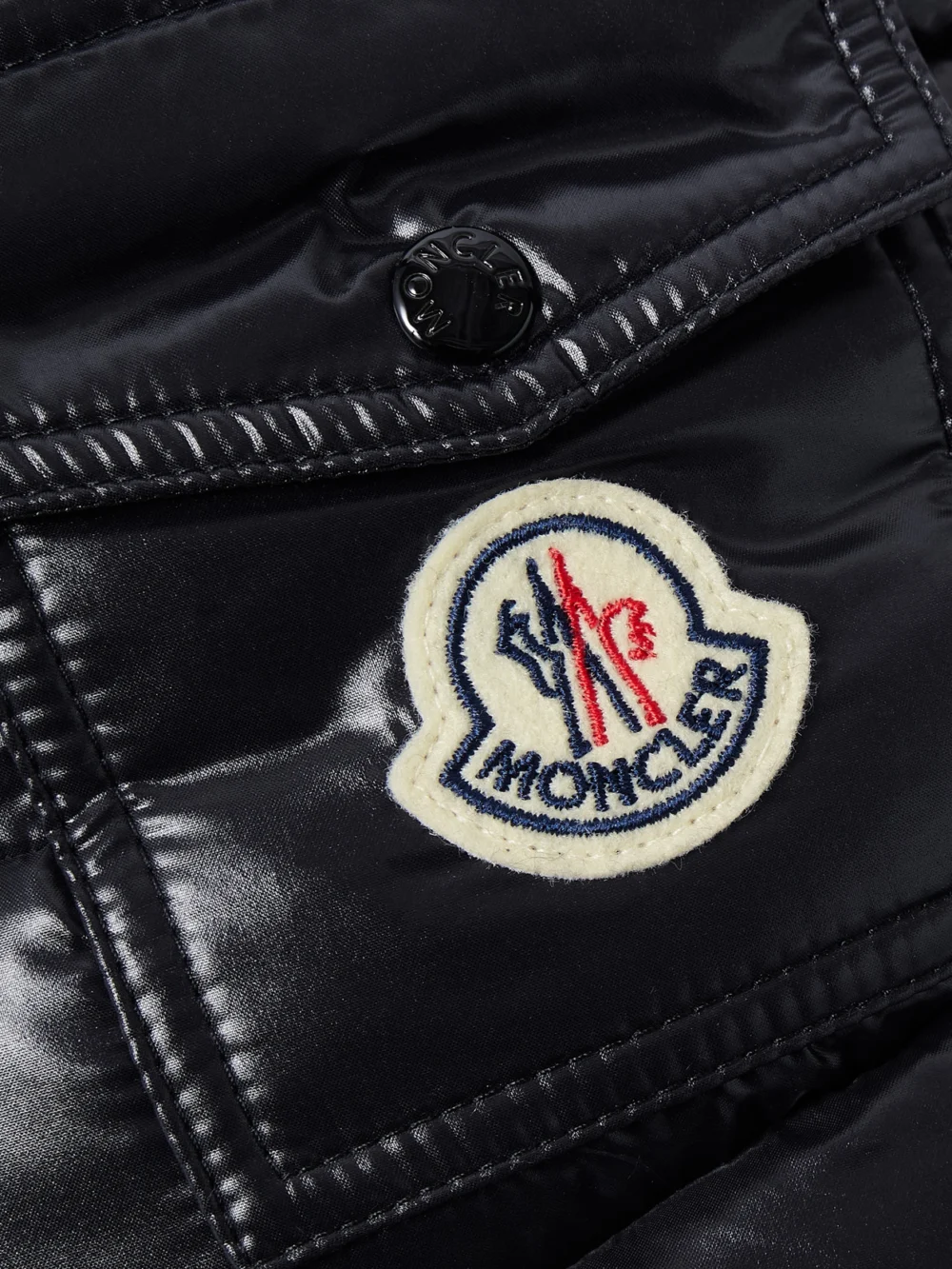 Close-up detail of the Moncler Gaia Fleece-trimmed Quilted Shell Boots