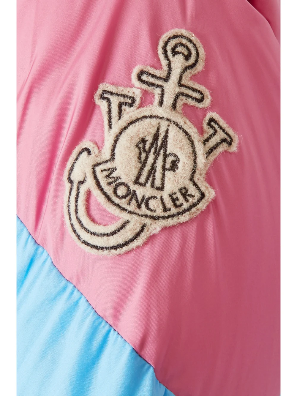 Close-up detail of the Moncler Genius + 1 Jw Anderson Bickly Color-block Hooded Quilted Shell Down Jacket