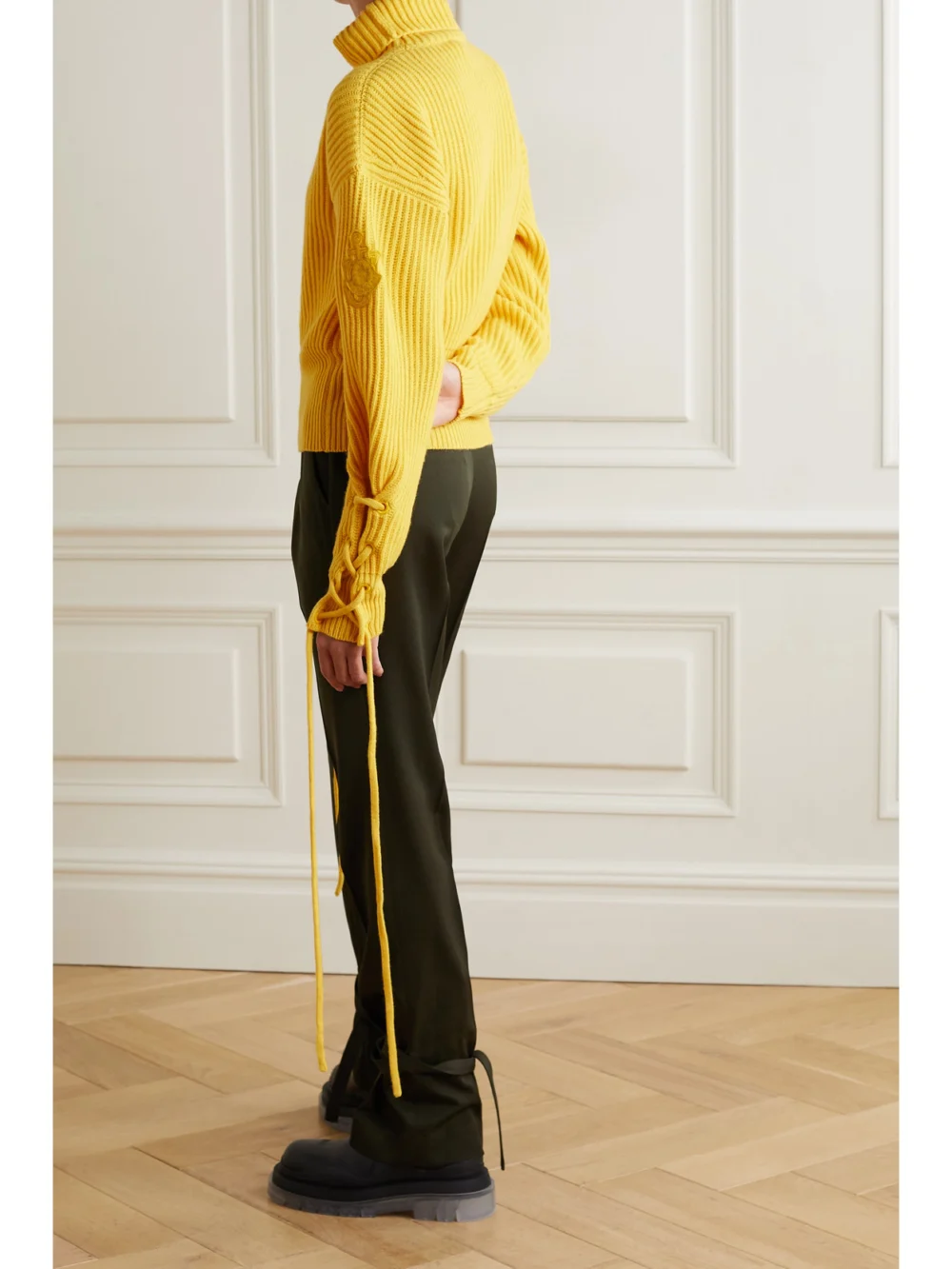Back view of the Moncler Genius + 1 Jw Anderson Lace-up Ribbed Wool and Cashmere-blend Turtleneck Sweater