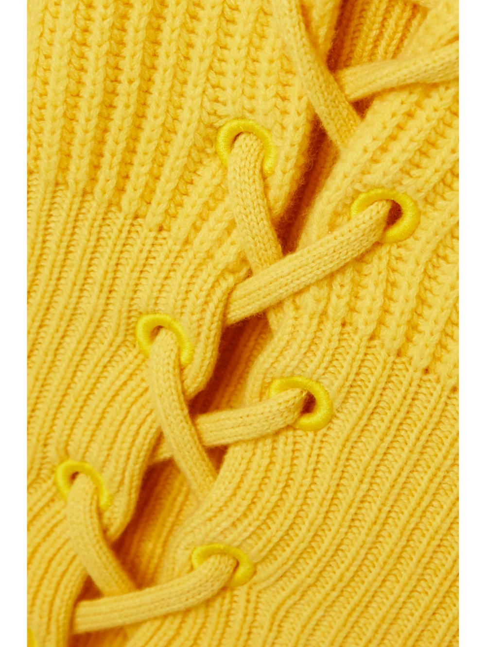 Close-up detail of the Moncler Genius + 1 Jw Anderson Lace-up Ribbed Wool and Cashmere-blend Turtleneck Sweater