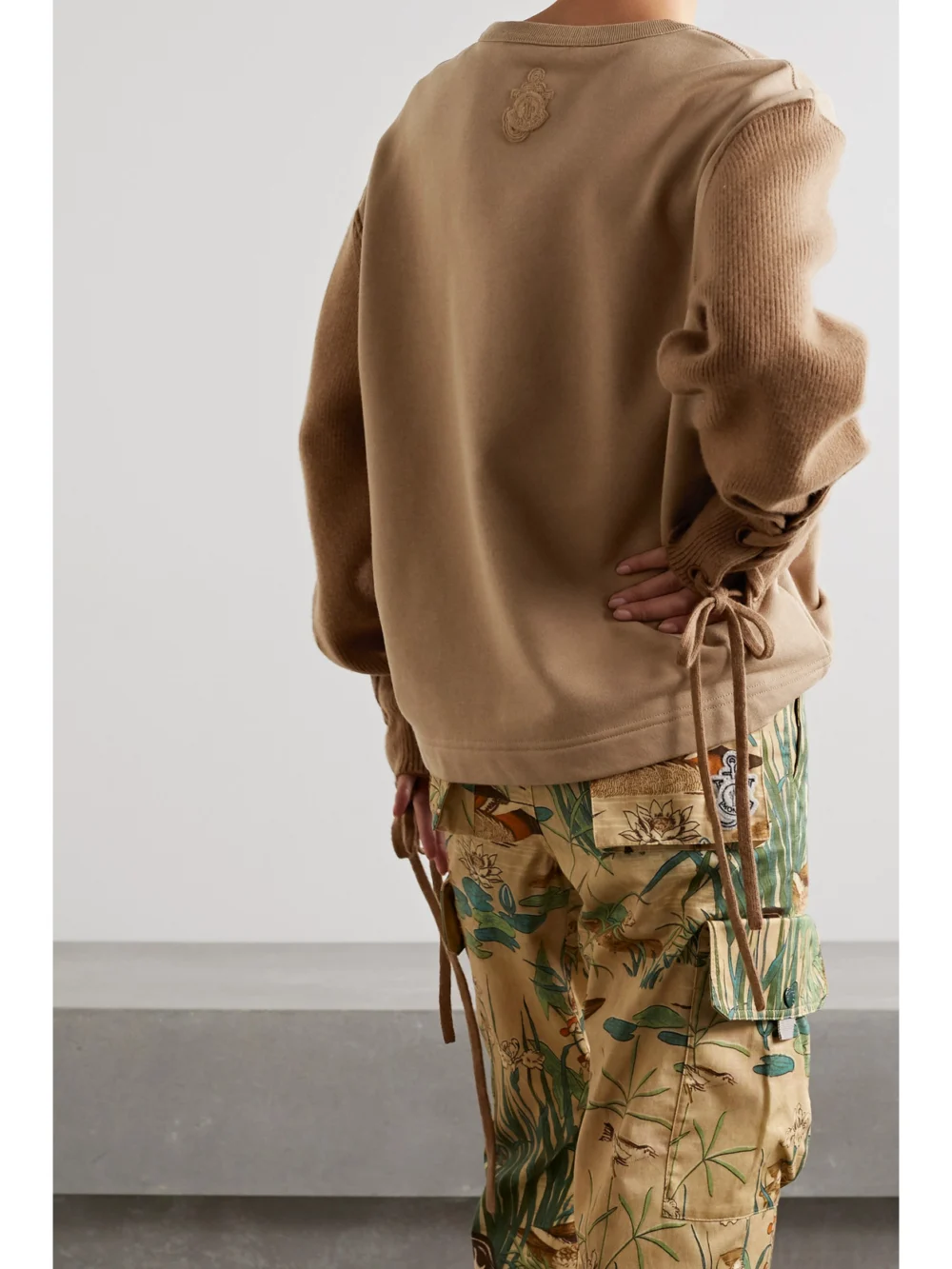 Back view of the Moncler Genius + 1 Jw Anderson Two-tone Embroidered Cotton-jersey and Wool Top