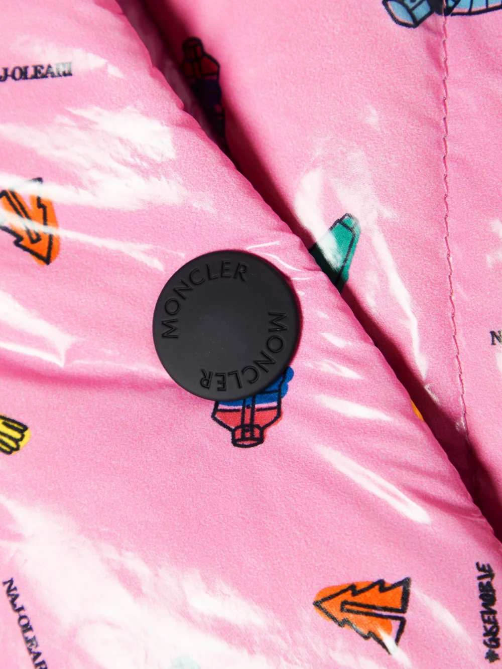 Close-up detail of the Moncler Genius + 3 Moncler Grenoble Cropped Printed Quilted Down Ski Jacket