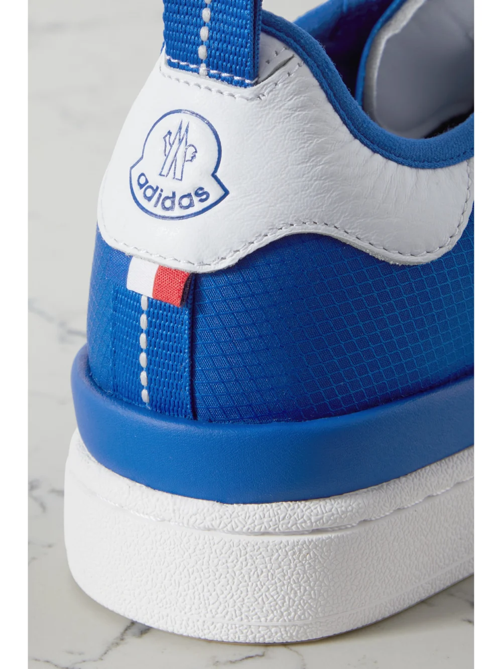 Close-up detail of the Moncler Genius + Adidas Originals Campus Leather-trimmed Ripstop Sneakers