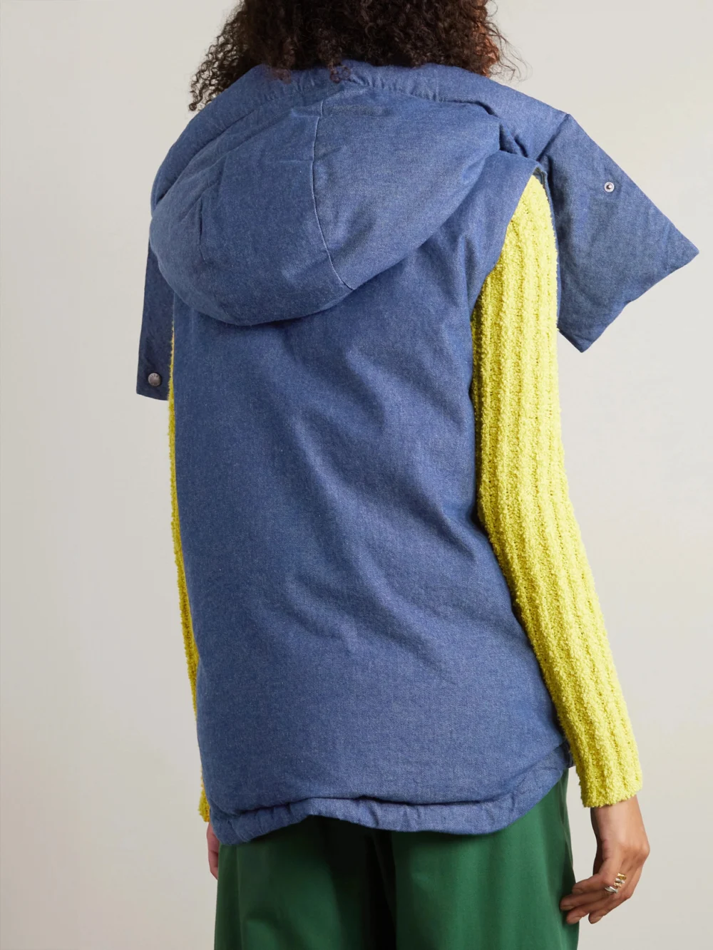 Back view of the Moncler Genius + Jw Anderson Dalby Hooded Faux Leather-trimmed Denim Down Vest