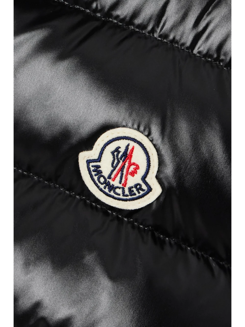 Close-up detail of the Moncler Ghany Quilted Glossed-shell Down Vest