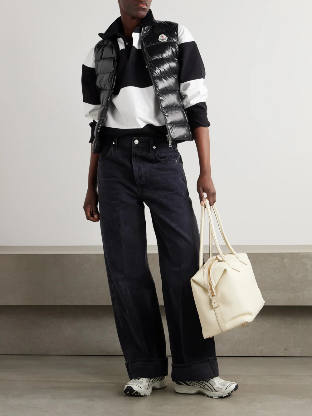 Moncler Ghany Quilted Glossed-shell Down Vest, worn by a model