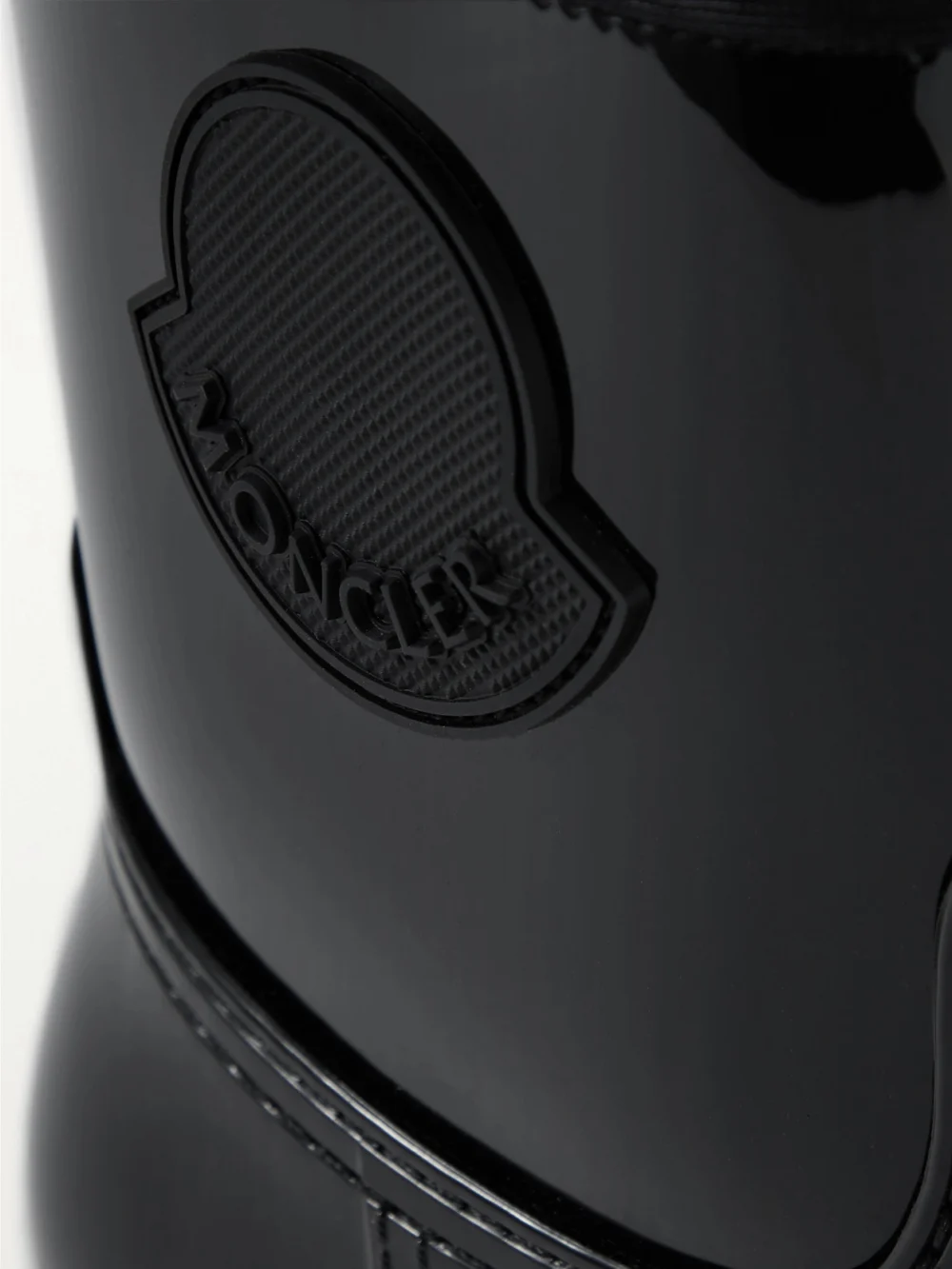 Close-up detail of the Moncler Ginette Logo-appliquéd Glossed-rubber Rain Boots