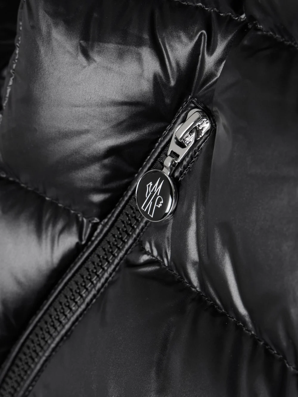 Close-up detail of the Moncler Gles Hooded Quilted Shell Down Jacket