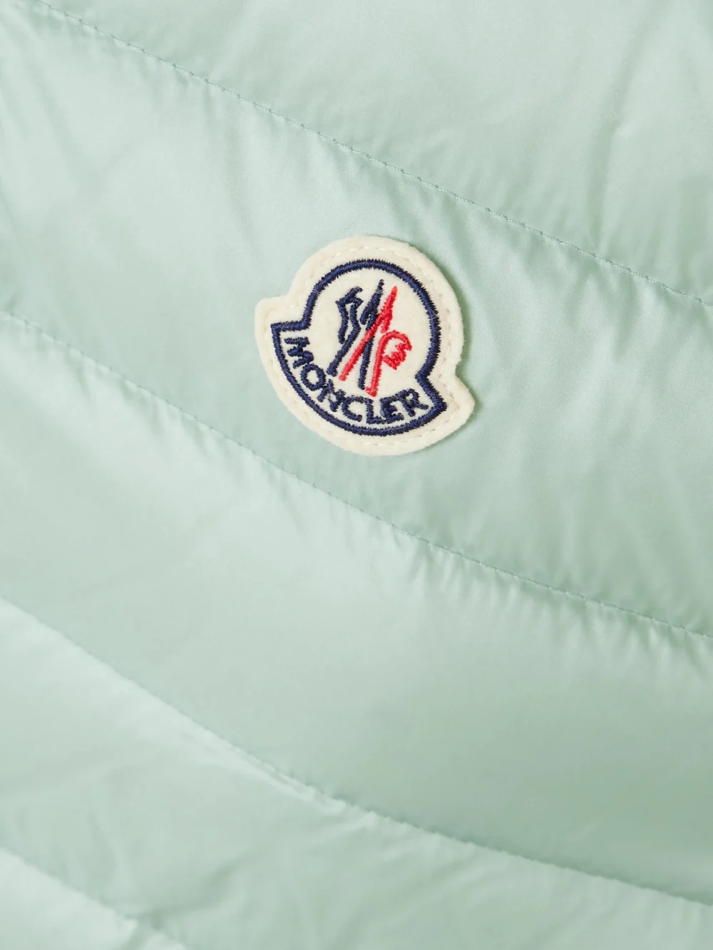 Close-up detail of the Moncler Glygosse Hooded Quilted Shell Down Vest