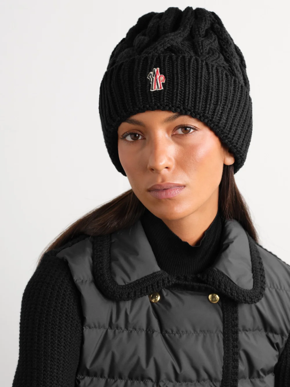 Moncler Grenoble Appliquéd Cable-knit Wool Beanie, styled view