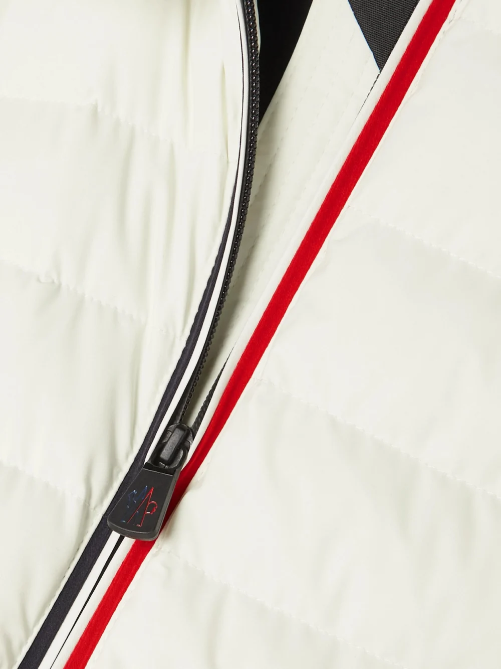 Close-up detail of the Moncler Grenoble Bruche Belted Two-tone Quilted Down Ski Jacket
