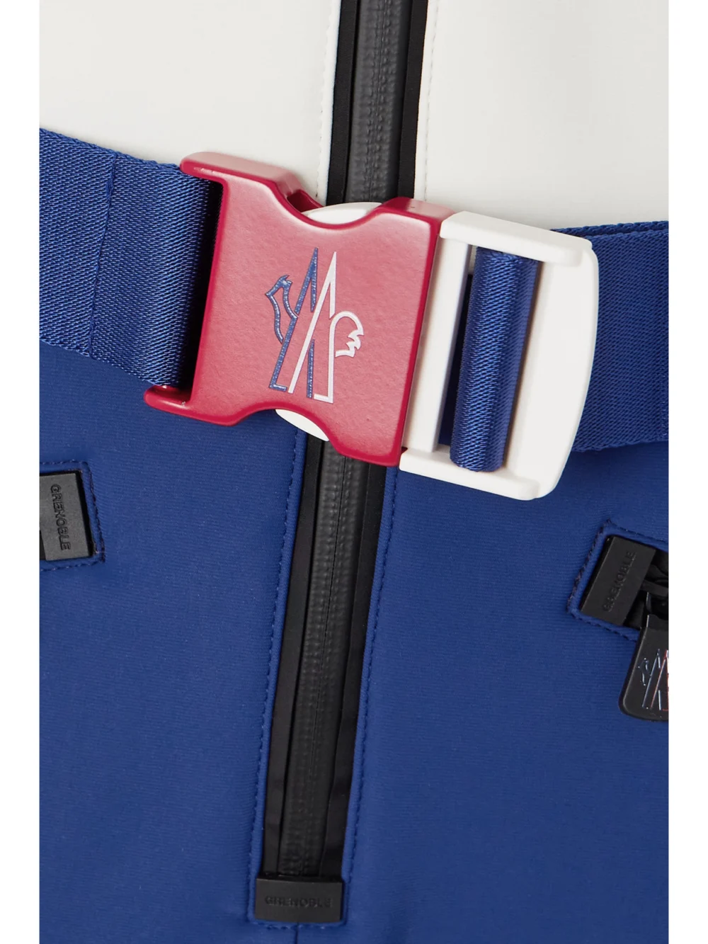Close-up detail of the Moncler Grenoble Hooded Belted Color-block Down Ski Suit