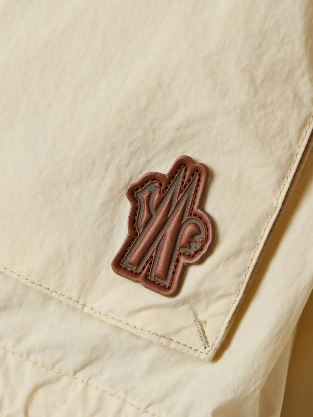 Close-up detail of the Moncler Grenoble Limosee Hooded Crinkled-shell Jacket