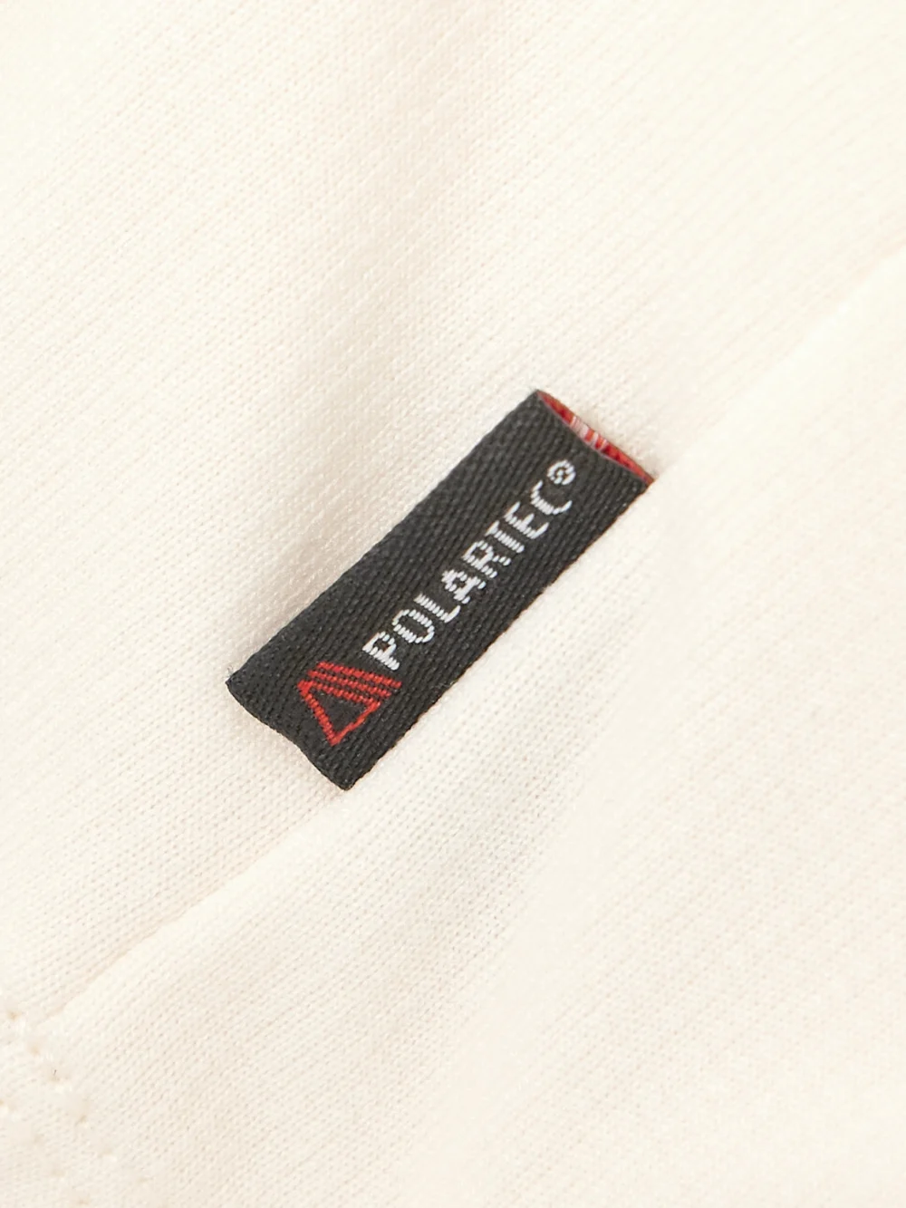 Close-up detail of the Moncler Grenoble Polartec® Stretch-knit Turtleneck Base Layer