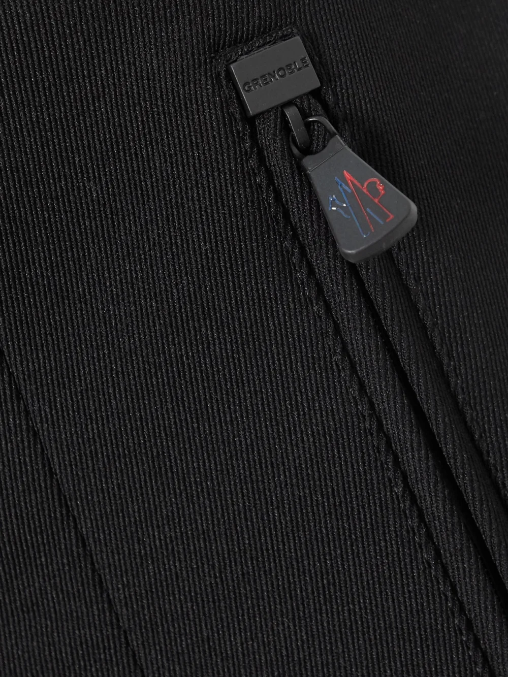 Close-up detail of the Moncler Grenoble Sportivo Stretch-twill Bootcut Ski Pants