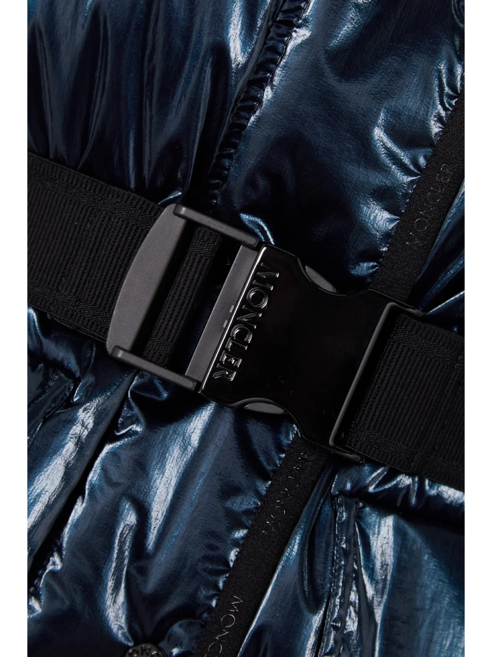 Close-up detail of the Moncler Herault Hooded Quilted Padded Glossed-shell Down Coat