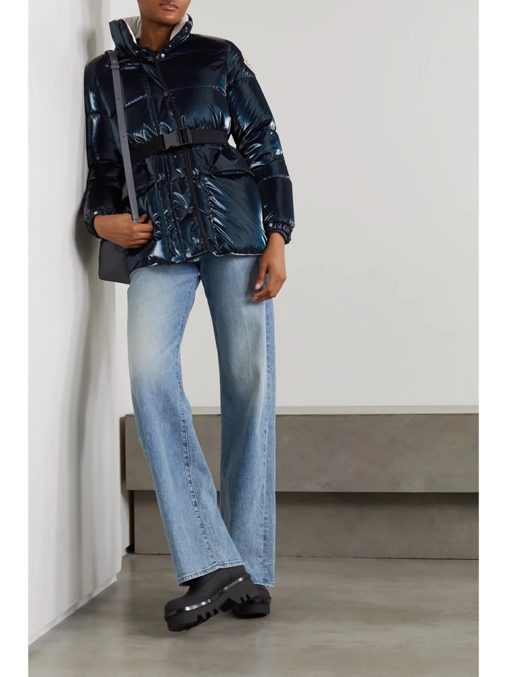Moncler Herault Hooded Quilted Padded Glossed-shell Down Coat, worn by a model