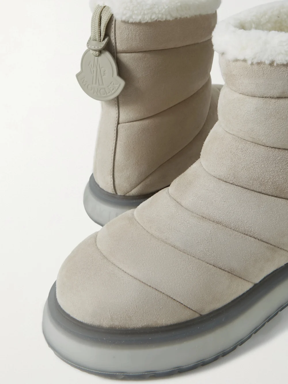 Close-up detail of the Moncler Hermosa Shearling-lined Suede Ankle Boots