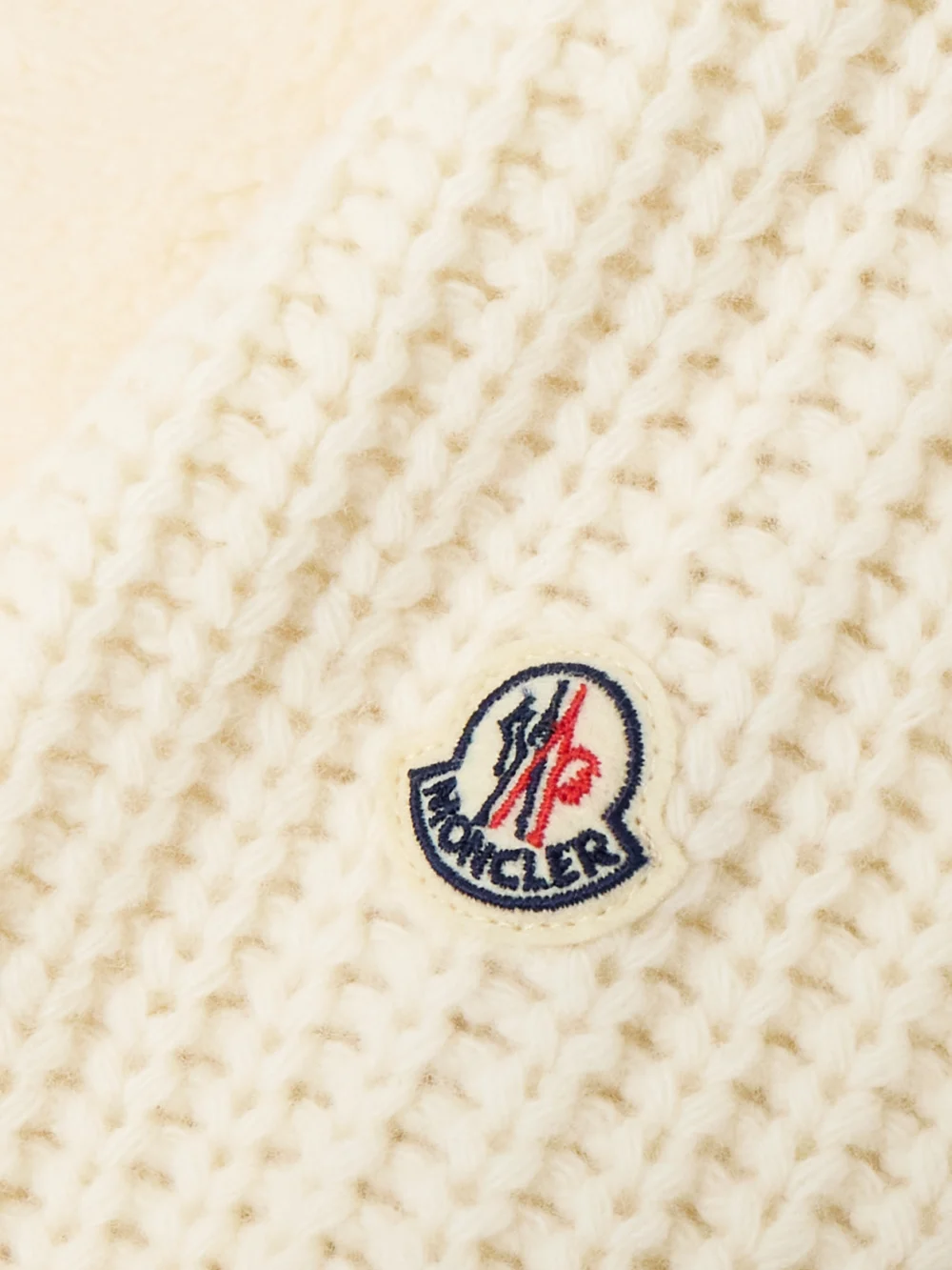 Close-up detail of the Moncler Hooded Fleece and Ribbed Wool Jacket