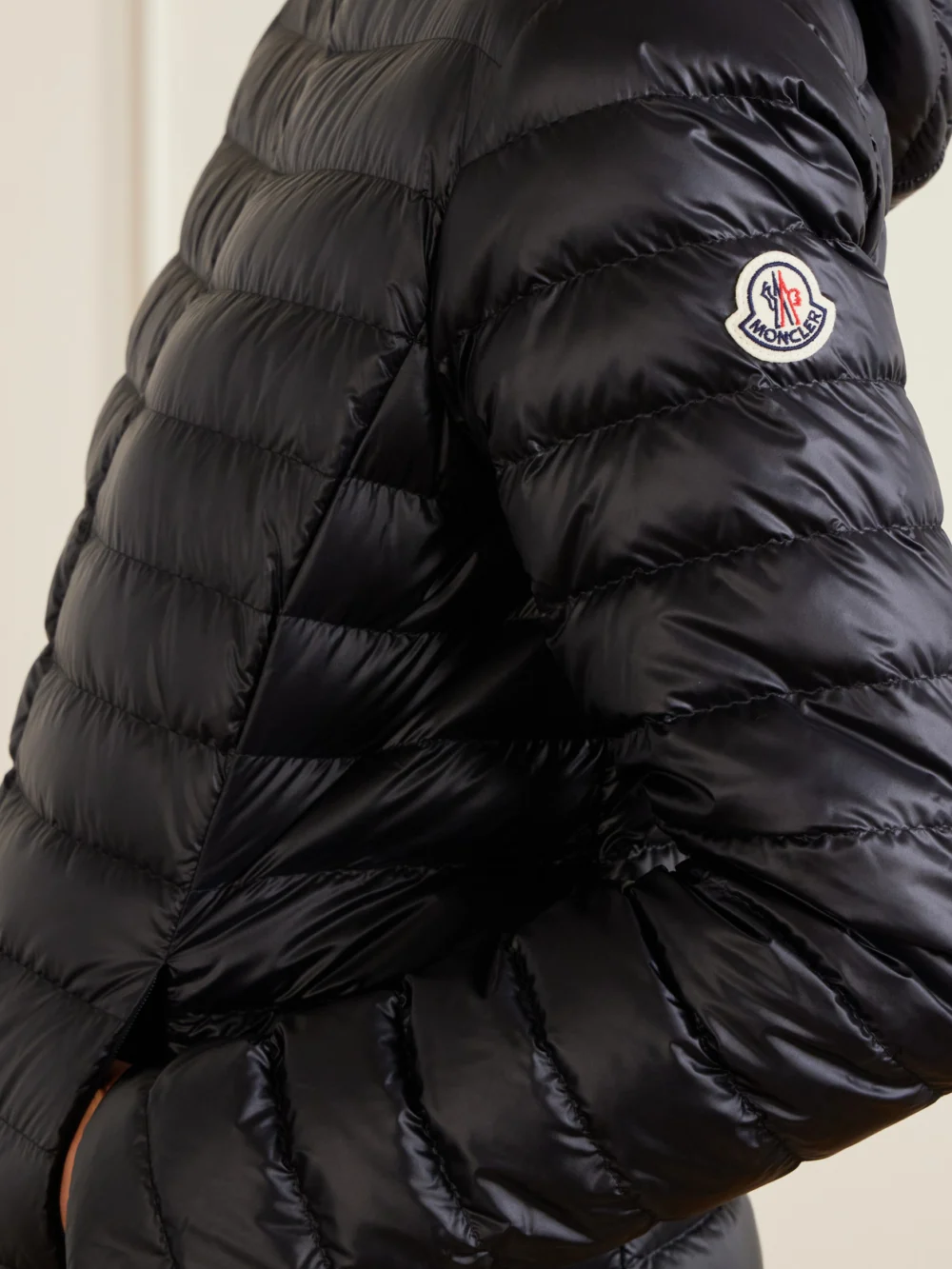 Close-up detail of the Moncler Igelhood Hooded Quilted Shell Down Jacket
