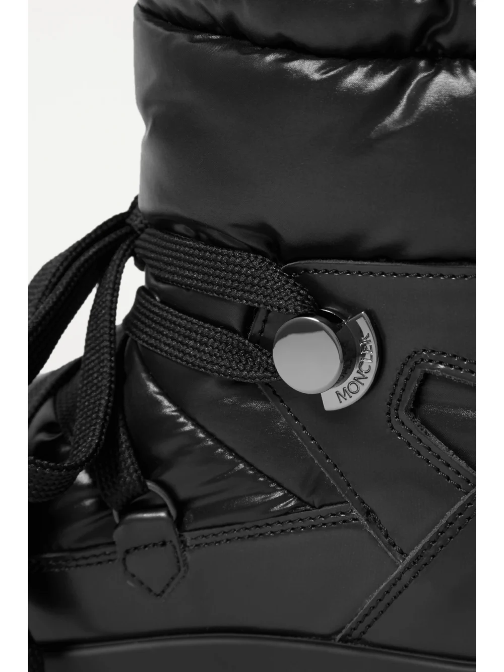 Close-up detail of the Moncler Insolux Leather and Padded Shell Ankle Boots