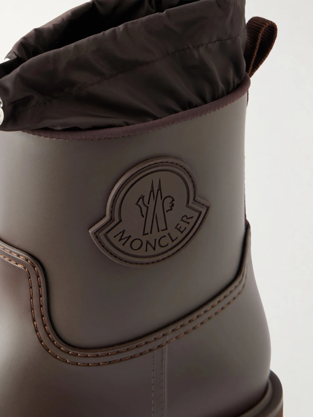 Close-up detail of the Moncler Kickstream Shell-trimmed Rubber Boots