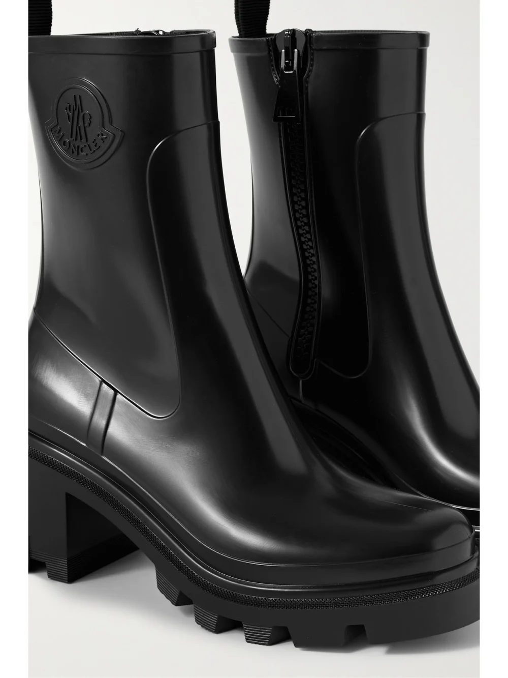 Close-up detail of the Moncler Loftgrip Embossed Rubber Rain Boots