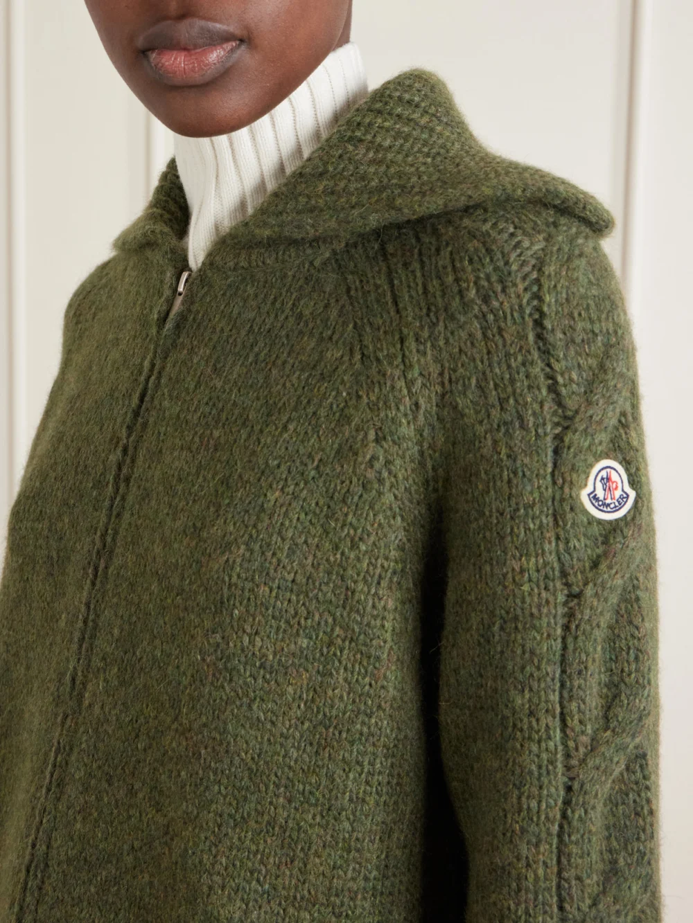 Close-up detail of the Moncler Logo-appliqué Cable Wool-blend Cardigan