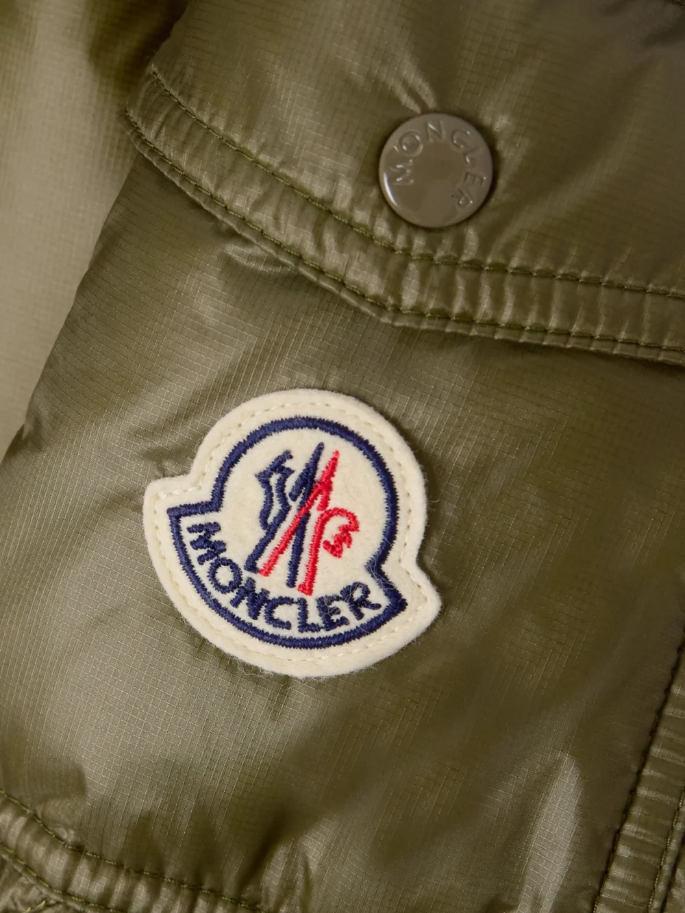 Close-up detail of the Moncler Lombi Quilted Micro-ripstop Down Parka