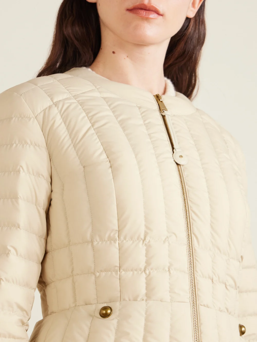 Close-up detail of the Moncler Menthe Appliquéd Padded Quilted Shell Down Jacket