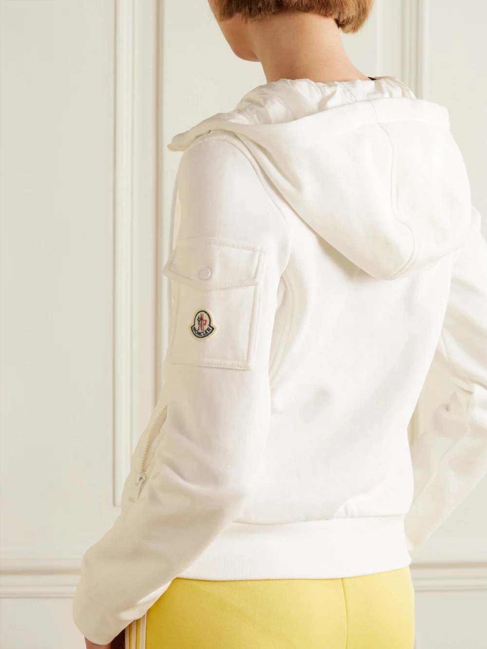 Back view of the Moncler Paneled Cotton-blend Terry and Quilted Shell Down Hoodie