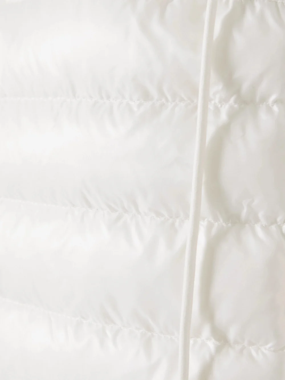 Close-up detail of the Moncler Paneled Cotton-blend Terry and Quilted Shell Down Hoodie