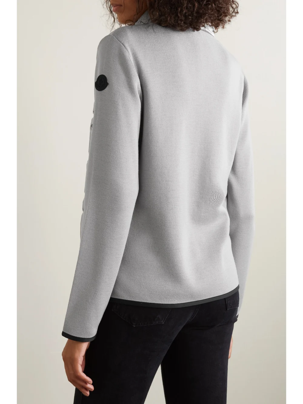Back view of the Moncler Paneled Wool-blend and Quilted Shell Down Jacket