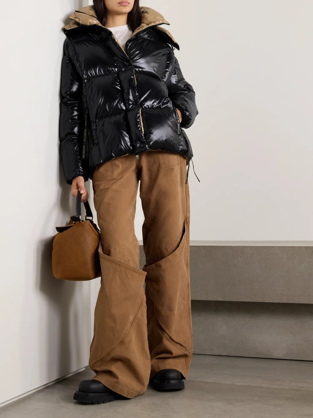 Moncler Parana Logo-appliquéd Quilted Shell Hooded Down Jacket, worn by a model