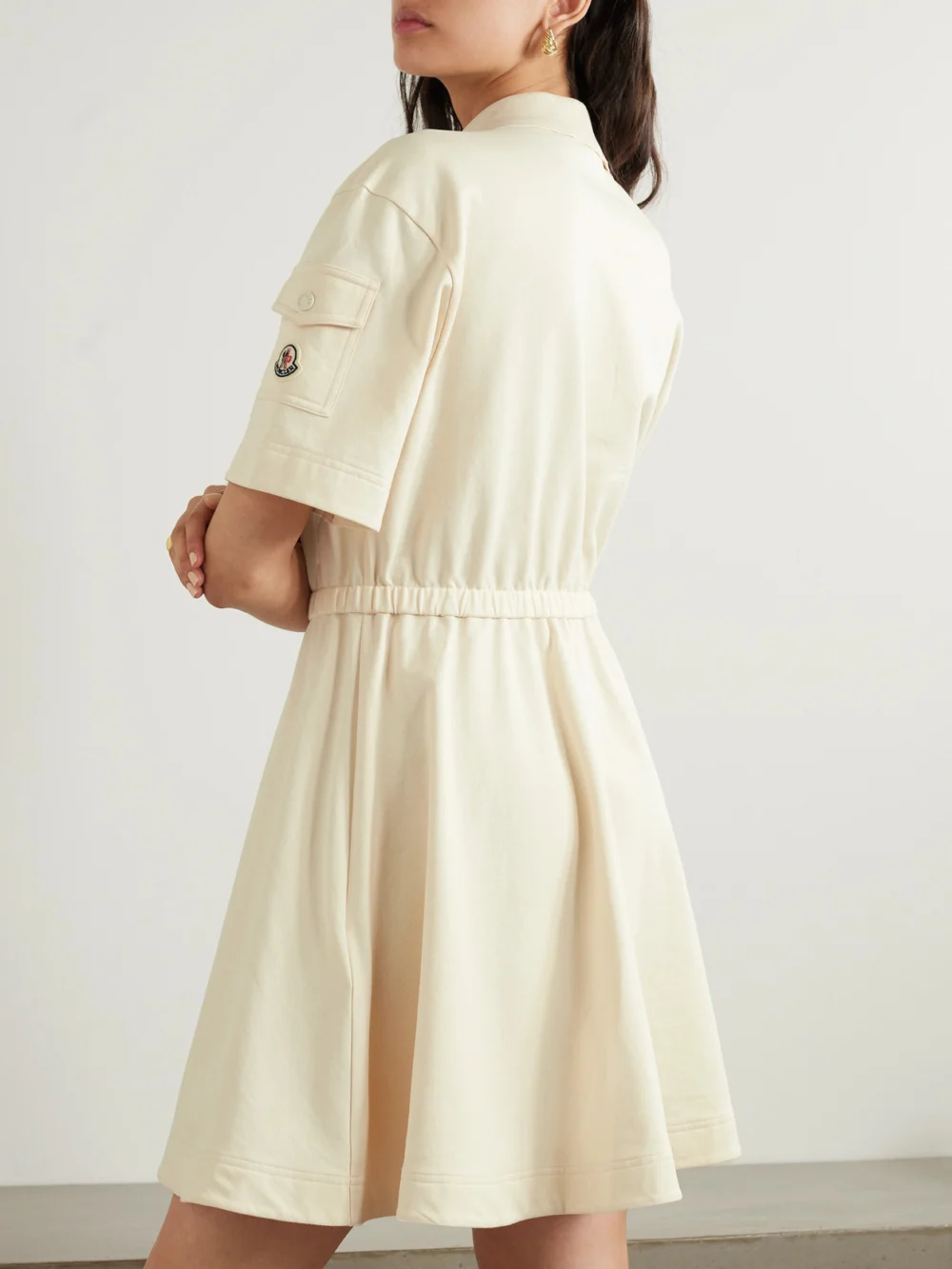 Back view of the Moncler Pleated Cotton-piqué Mini Shirt Dress