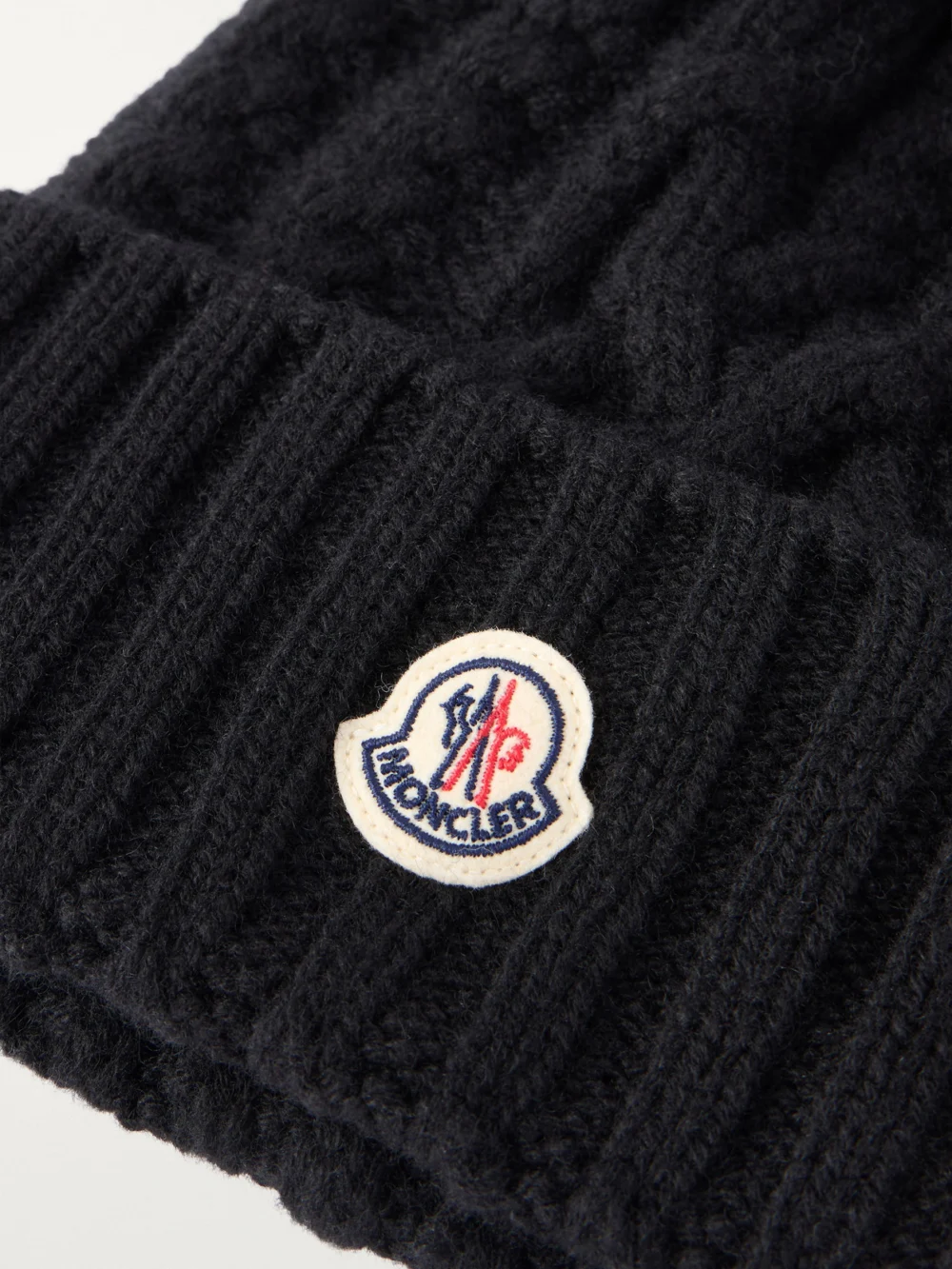 Close-up detail of the Moncler Plush-trimmed Wool and Cashmere-blend Beanie