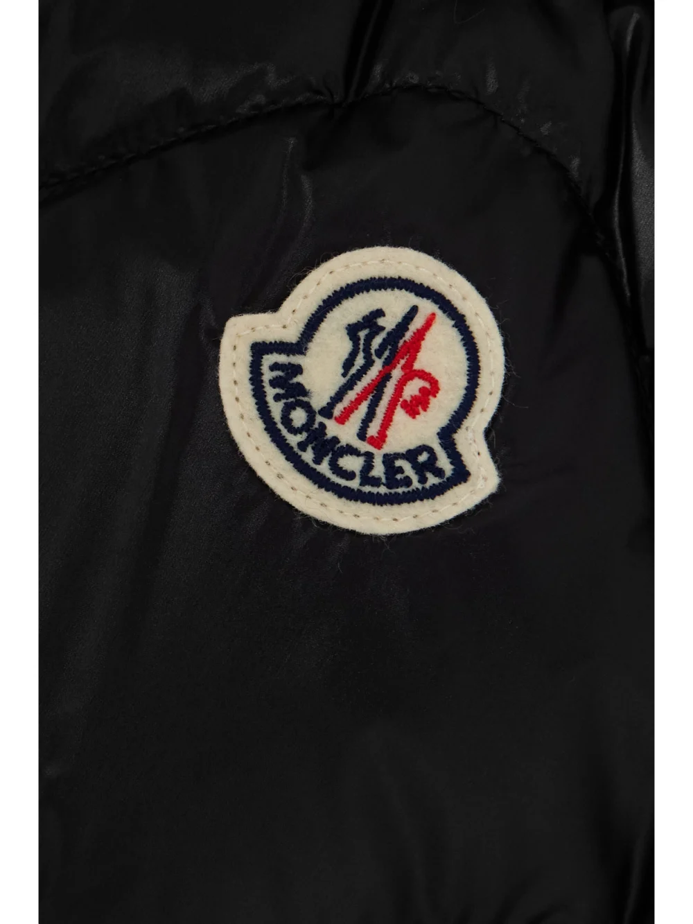 Close-up detail of the Moncler Quilted Shell Down Mini Wrap Skirt