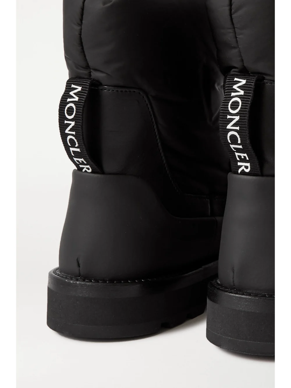 Close-up detail of the Moncler Rain Don't Care Paneled Leather and Shell Ankle Boots