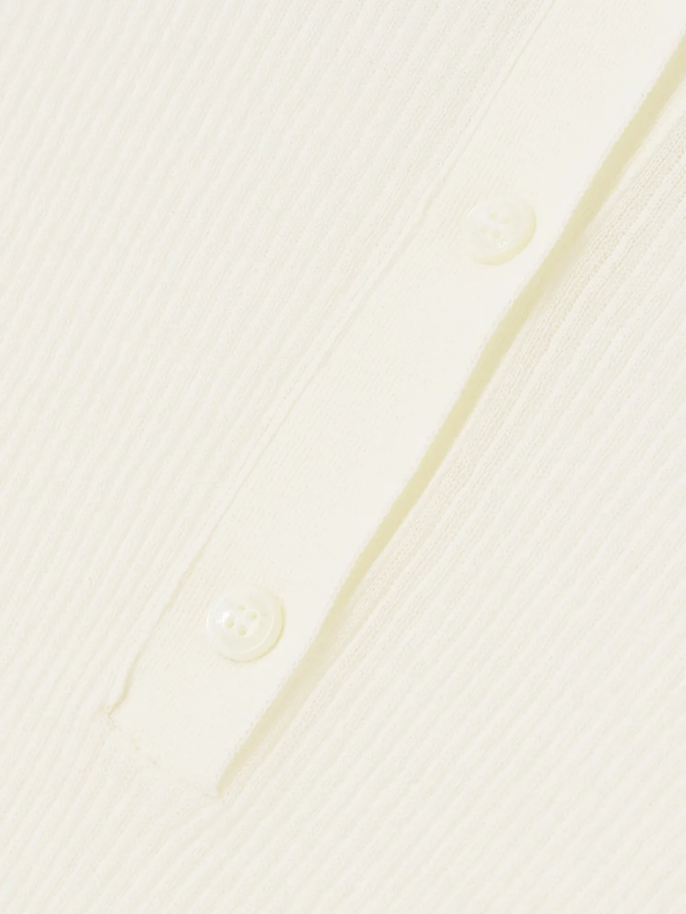 Close-up detail of the Moncler Ribbed Cotton-blend Polo Shirt