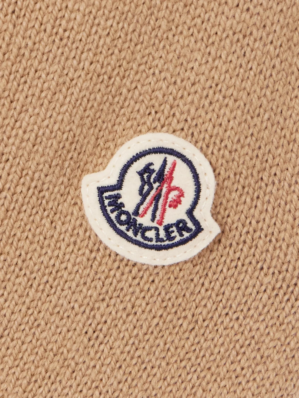 Close-up detail of the Moncler Ribbed Wool and Cashmere-blend Polo Sweater